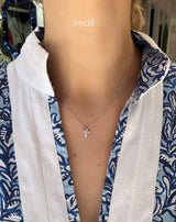 Colgante de cruz de diamantes